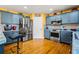Updated kitchen featuring stainless steel appliances and abundant cabinet space at 859 Pownal Ln, Hampton, GA 30228