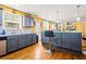 Spacious kitchen with granite countertops, stainless appliances, and hardwood floors at 859 Pownal Ln, Hampton, GA 30228
