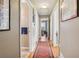 Hallway with hardwood floors and neutral colored walls at 2434 Skyland Ne Trl, Brookhaven, GA 30319