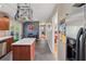 Well-lit kitchen features granite counters, a center island, and stainless steel appliances at 2434 Skyland Ne Trl, Brookhaven, GA 30319