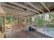 Relaxing screened porch with rocking chairs providing a bug-free outdoor living space at 2434 Skyland Ne Trl, Brookhaven, GA 30319
