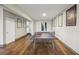 Spacious basement with wood floors, ping pong table and framed art, perfect for recreation at 5386 Bluestone Cir, Mableton, GA 30126