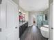A well-appointed bathroom with double vanity, soaking tub, and frameless glass shower at 5386 Bluestone Cir, Mableton, GA 30126