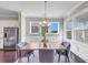 Dining area features stainless steel appliances, hardwood floors, and a chandelier at 5386 Bluestone Cir, Mableton, GA 30126