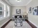 Comfortable living room with neutral colors, shuttered windows and stylish decor at 5386 Bluestone Cir, Mableton, GA 30126