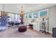 This office features large windows, a vanity, and a purple ottoman at 5386 Bluestone Cir, Mableton, GA 30126