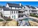 Large backyard with a pool, spa, patio, and two-story porch providing outdoor living at its finest at 109 Owens Mill Pl, Canton, GA 30115