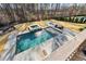 Backyard pool with spa, patio and firepit offers an entertainer's dream space at 109 Owens Mill Pl, Canton, GA 30115