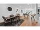 Finished basement with hardwood floors, a pool table, dining area, and ample seating at 109 Owens Mill Pl, Canton, GA 30115
