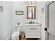 Bathroom with marble vanity, gold hardware, and contemporary fixtures at 109 Owens Mill Pl, Canton, GA 30115