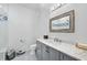 Bright bathroom featuring modern fixtures, vanity with marble countertop, and a shower at 109 Owens Mill Pl, Canton, GA 30115