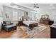 Well-decorated bedroom with hard wood floors, ceiling fan, plenty of natural light and neutral colored walls at 109 Owens Mill Pl, Canton, GA 30115