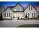 Inviting home exterior with a well-manicured lawn, and a welcoming entrance at 109 Owens Mill Pl, Canton, GA 30115