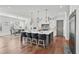 Bright kitchen with large island and seating, open to the dining area at 109 Owens Mill Pl, Canton, GA 30115