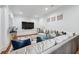 Cozy living room featuring a plush sofa, hardwood floors, neutral paint and recessed lighting at 109 Owens Mill Pl, Canton, GA 30115
