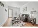 Comfortable living area features a plush sofa, hardwood floors, and stylish decor at 109 Owens Mill Pl, Canton, GA 30115