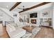 Inviting living room features a fireplace with marble surround and wood beams at 109 Owens Mill Pl, Canton, GA 30115