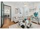 Elegant living room featuring stylish décor, hardwood floors, and a modern chandelier at 109 Owens Mill Pl, Canton, GA 30115