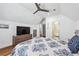 Spacious bedroom featuring hardwood floors, a ceiling fan, and neutral walls at 109 Owens Mill Pl, Canton, GA 30115