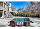 Backyard oasis with a beautiful pool and spa along with seating for entertaining at 109 Owens Mill Pl, Canton, GA 30115