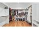 Spacious walk-in closet features wood floors, white shelving, and clothing racks at 109 Owens Mill Pl, Canton, GA 30115
