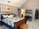 Bedroom with a high ceiling and a door that leads to a bathroom at 507 Madison Se Ct, Smyrna, GA 30080