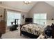 Bedroom features a large bed and two big windows at 507 Madison Se Ct, Smyrna, GA 30080