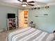 Bedroom with bed, fun decor and a doorway leading into the kitchen at 507 Madison Se Ct, Smyrna, GA 30080