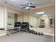 Well-equipped home gym featuring a treadmill, weights, and mirrors, creating an inviting workout space at 507 Madison Se Ct, Smyrna, GA 30080