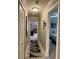 Bright hallway featuring an area rug and doorway to a bedroom at 507 Madison Se Ct, Smyrna, GA 30080