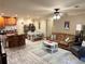 Open-concept condo with a comfortable living room, modern lighting, and a dining and kitchen area at 507 Madison Se Ct, Smyrna, GA 30080