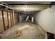 Unfinished basement, showcasing exposed beams and walls, and including a water heater at 2612 Clairmont Ne Rd, Atlanta, GA 30329