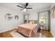 Sunlit bedroom with hardwood floors, neutral decor and ample natural light at 2612 Clairmont Ne Rd, Atlanta, GA 30329