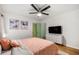 Bright bedroom with ceiling fan, TV, and decorative artwork offering a relaxing space at 2612 Clairmont Ne Rd, Atlanta, GA 30329