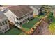 Backyard with a well maintained lawn, black metal fencing, and multiple elevated decks at 722 Laurel Canyon Pkwy, Canton, GA 30114