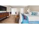Bedroom featuring wood floors, modern finishes, and ensuite bathroom at 722 Laurel Canyon Pkwy, Canton, GA 30114