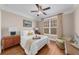 Cozy bedroom featuring natural light and a comfortable armchair at 722 Laurel Canyon Pkwy, Canton, GA 30114