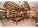 Billiards room featuring multiple pool tables, overhead lighting, and ample space for entertainment and recreation at 722 Laurel Canyon Pkwy, Canton, GA 30114