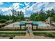 Elevated view of the sparkling community pool and surrounding landscaped area for residents to relax and enjoy at 722 Laurel Canyon Pkwy, Canton, GA 30114