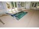 Indoor hot tub with tile accents and handrails, surrounded by large windows at 722 Laurel Canyon Pkwy, Canton, GA 30114