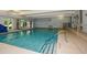 Bright indoor pool with steps and a wheelchair ramp for easy access at 722 Laurel Canyon Pkwy, Canton, GA 30114