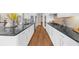 Modern kitchen island with stainless appliances and white cabinetry and beautiful countertops at 722 Laurel Canyon Pkwy, Canton, GA 30114