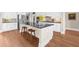 Bright and modern kitchen featuring granite countertops, stainless appliances and hardwood floors at 722 Laurel Canyon Pkwy, Canton, GA 30114
