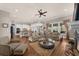 Bright living room with large windows, hardwood floors, open layout and inviting fireplace at 722 Laurel Canyon Pkwy, Canton, GA 30114