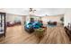 An open concept living room with hardwood floors and a nice view to the backyard make this a perfect gathering spot at 722 Laurel Canyon Pkwy, Canton, GA 30114