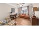 Bright living room with natural light, sofa and a desk at 722 Laurel Canyon Pkwy, Canton, GA 30114