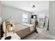 Cozy bedroom with neutral tones, natural light, and stylish decor for a comfortable living space at 119 Old Vandiver Dr, Canton, GA 30114