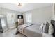 Comfortable bedroom featuring natural light, calming decor, and cozy bedding at 119 Old Vandiver Dr, Canton, GA 30114