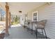 Inviting front porch with stylish seating, offering a perfect spot for relaxing outdoors at 119 Old Vandiver Dr, Canton, GA 30114