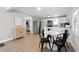 Contemporary kitchen with modern appliances, clean countertops, and stylish breakfast bar at 119 Old Vandiver Dr, Canton, GA 30114